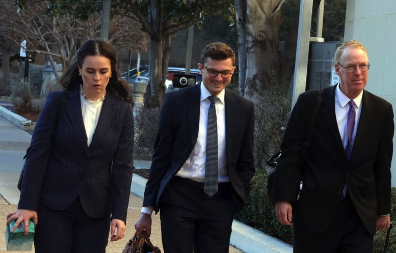 Attorney Paul Cassell and team